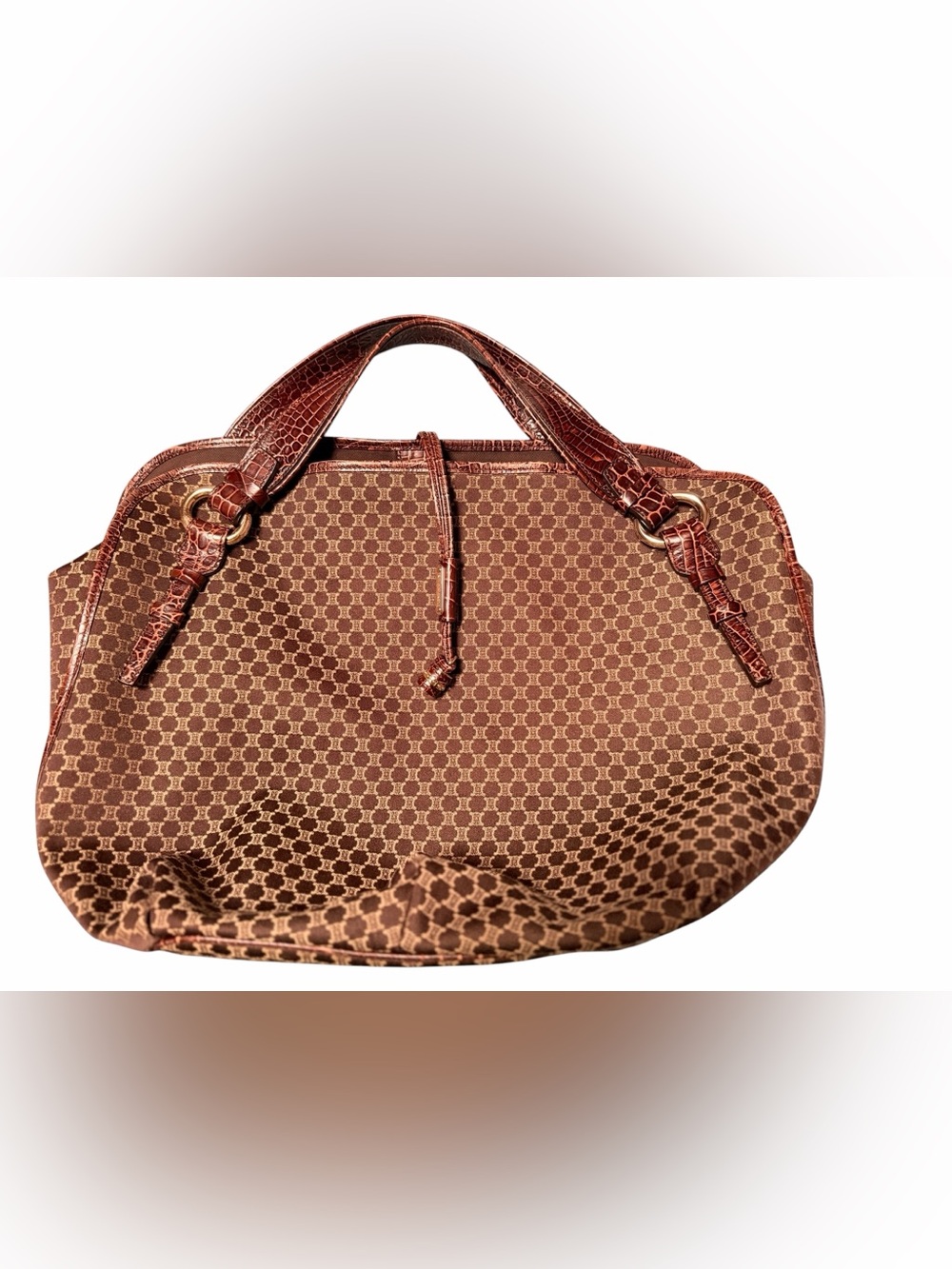 Stylish Brown Celine Bitter Sweet Boogie hand bag with Leather Strap and piping.